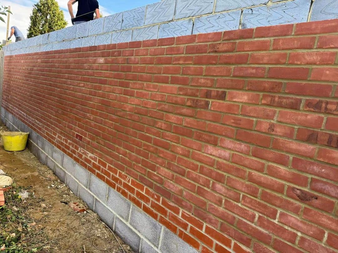 Red facing brick to match the house