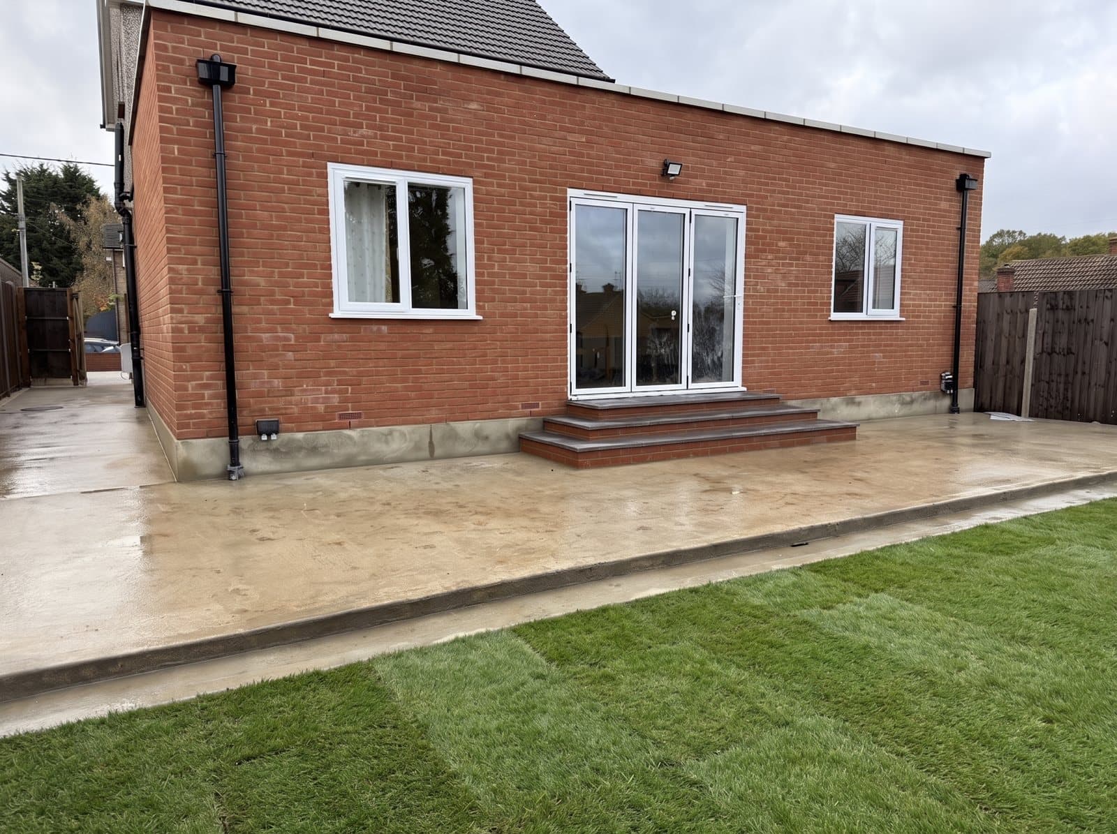 A finished single-storey red-brick rear extension, by Dragoi Construction