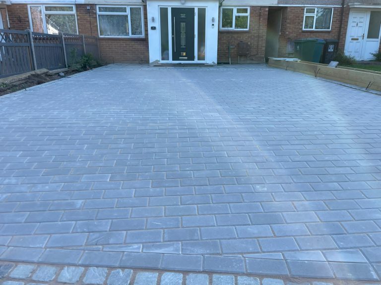 Residential driveway renovation with bricks